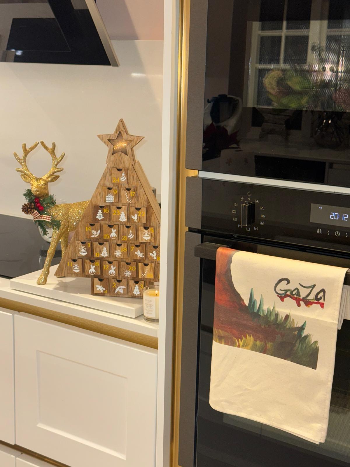 We remain like oil and olives Tea-Towel