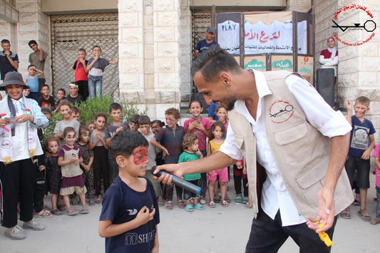 Gift donation of a puppet and clown show for Gaza's children